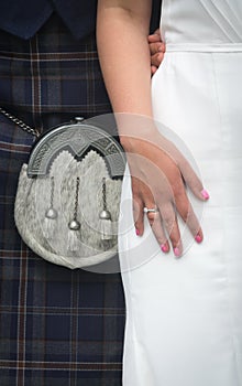Closeup of Scottish Bride and Groom Wearing a Kilt at Wedding