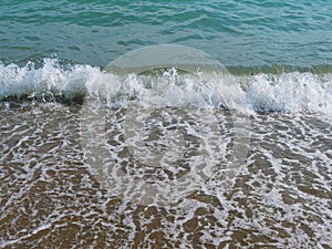 Closeup of sea wave with surf and foam, natural movement of sea water