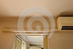 Air conditioning duct above the door