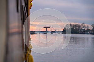 Closeup selective focus shot of golden tassels hanging over a boat in Elburg, Netherlands