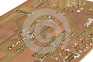 Closeup of a self-made printed circuit board with microcontroller
