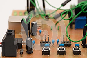 Closeup of a self-made printed circuit board with microcontroller