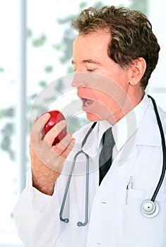 Closeup Senior Doctor Eating Red Apple