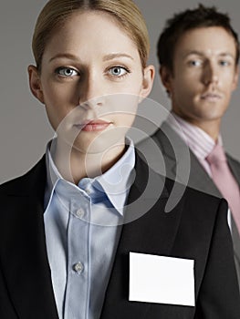 Closeup Of Serious Businesswoman With Businessman