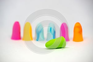 Set of colorful earplugs isolated on white background with space for copytext