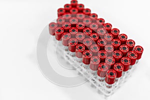 Closeup set of sterile vacuum test-tubes for blood sample. Science and medicine concept