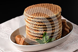 Closeup several stacked stroop wafels or dutch waffles made from caramel syrup