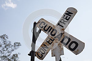 Closeup shot of aged rusty railroad crossing sign