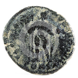 Closeup shot of an ancient Roman copper coin of Emperor Theodosius, reverse