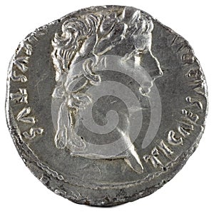 Closeup shot of ancient Roman denarius coin with emperor Tiberius engraving photo