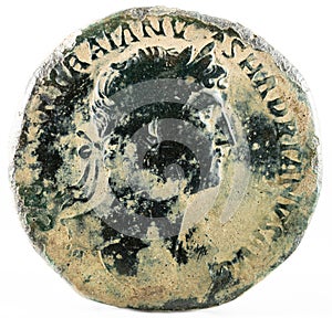 Closeup shot of an ancient Roman sestertius coin with emperor Hadrian inscription