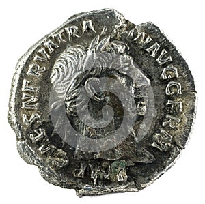 Closeup shot of an ancient Roman silver denarius coin of Emperor Trajan, obverse