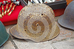 Closeup shot of an antique and rusty military helmet