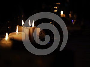 Closeup shot of atmospheric candlelights of marriage ceremony