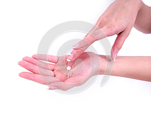 Closeup shot of beautiful woman`s hands with cream, isolated on white background, Soft skin, skincare concept