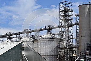Closeup shot of a big industrial factory under a blue sky