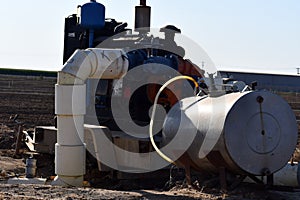 Closeup shot of a big industrial factory under a blue sky