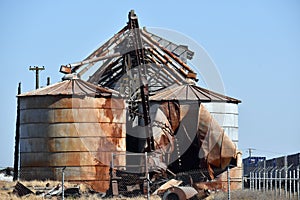 Closeup shot of a big industrial factory under a blue sky