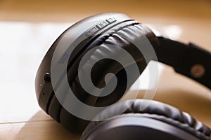 Closeup shot of a bluetooth headphone with controls photo