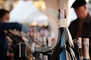 A closeup shot of bottles display at exhibitor stand at food and wine fair