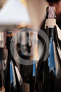 A closeup shot of bottles display at exhibitor stand at food and wine fair