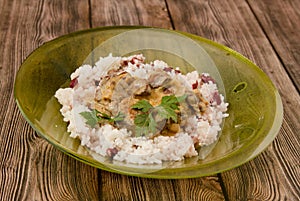 Closeup shot of a bowl of rice with beans and chicken liver