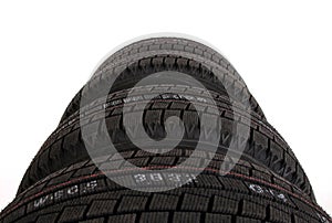 Closeup shot of a car tires isolated on a white background