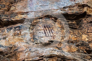 Closeup shot of cave paintings in Cueva Chiquita cave in the Natural Park of the Villuercas, Spain