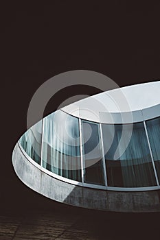 Closeup shot of a circular building made of glass