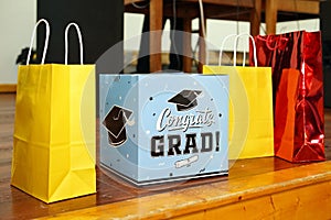 Closeup shot of colorful bags and displays to congratulate on graduation