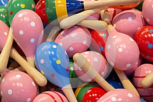 Closeup shot of colorful wooden maraca rattles shaker toy