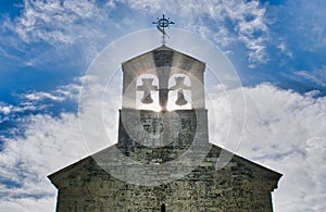 Closeup shot of the cross of San Juan Evangelista church in Arroyo de la Encomienda in Valladolid photo