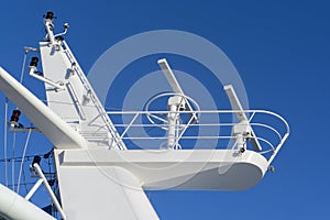 Closeup shot of a cruise ship radar on blue sky background