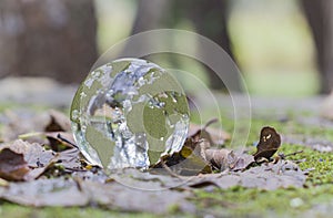 Closeup shot of a crystal ball with the map of the world