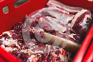 closeup shot of cut meat at the slaughterhouse, meat and food industry concept