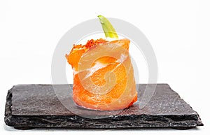 Closeup shot of delicious Gunkan sushi with salmon on white background