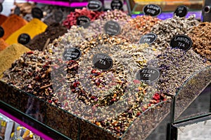 Closeup shot of different types of dried herbs for sale in a local market with blur blur background