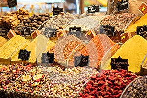 Closeup shot of different types of food spices for sale in a local market with blur blur background