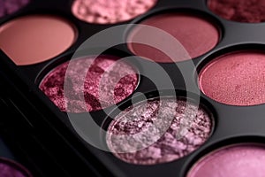Closeup shot of eyeshadow, cosmetics, makeup. Professional eyeshadow palette macro shot. Eye shadow collection, make up theme. AI