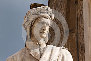Closeup shot of the famous white marble monument of Dante Alighieri in Florence photo