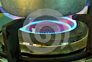 Closeup shot of fire, gas kitchen stove.