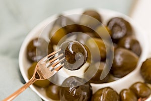 Closeup shot of a fork holding a fig jam