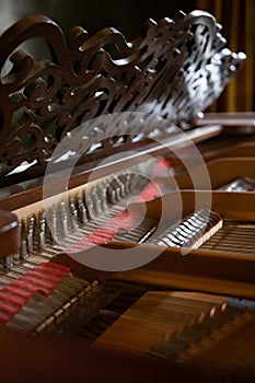 Closeup shot of a fortepiano with tiles photo