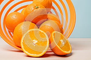 Closeup shot of freshly sliced oranges on a spiral bowl