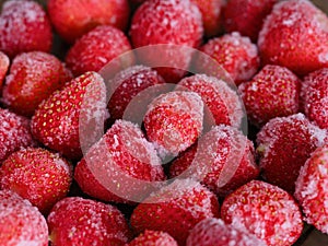 A closeup shot of a frozen strawberries