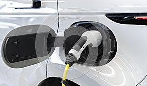 Closeup shot of a fuel dispenser in a tank cap of a white car