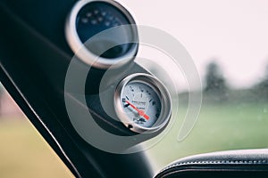 Closeup shot of a gas meter in a car