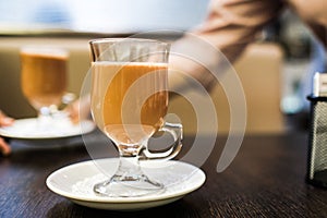 Closeup shot of a glass of hot teh tarik drink in a restaurant in Kuala Lumpur, Malaysia