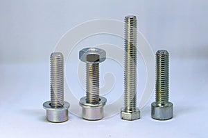 Closeup shot of a group of bolt and nut on white background