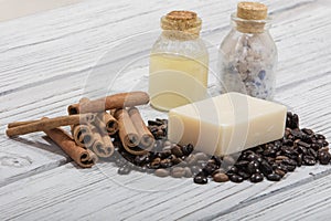 Closeup shot of handmade scented coffee soap with cinnamon on wooden background